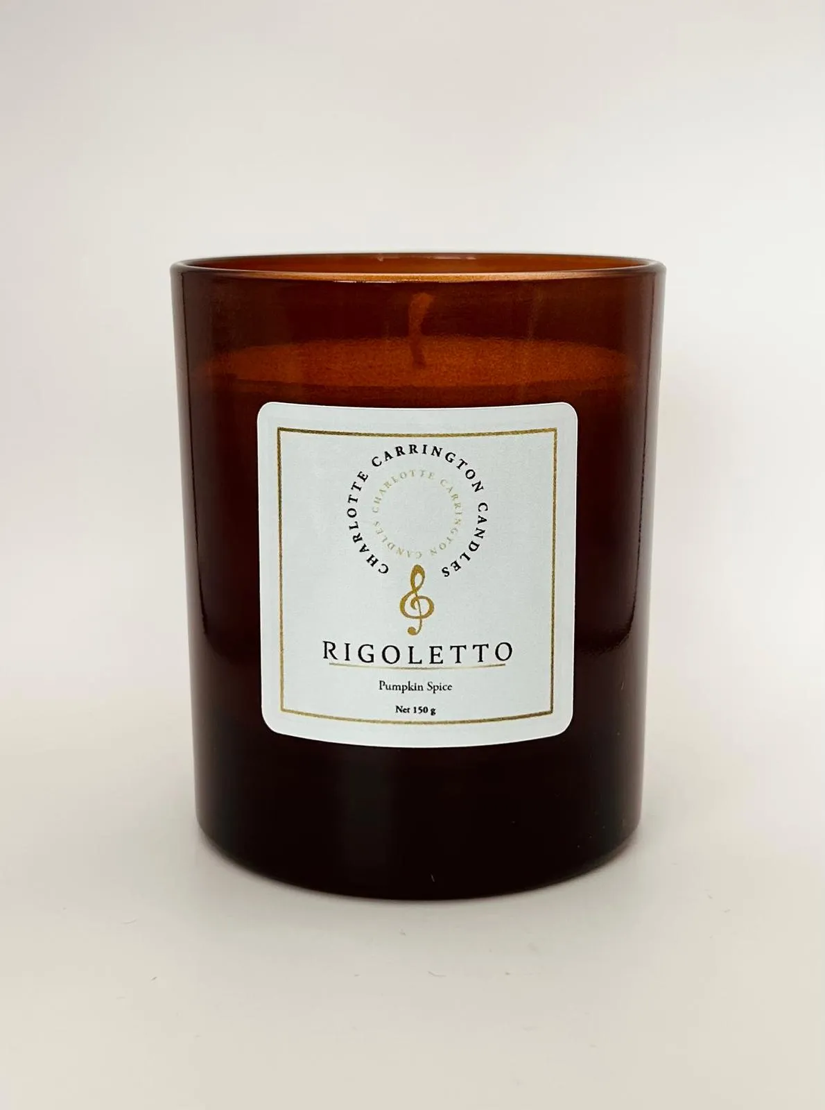 The front label of the Rigoletto scented candle from Charlotte Carrington Candles